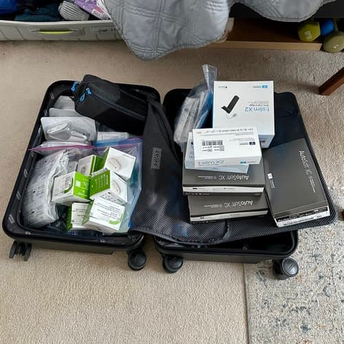 A suitcase packed with diabetes supplies
